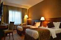 ห้องนอน Nozol Royal Inn Hotel