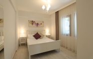 Kamar Tidur 4 Alp Suites Lavanta