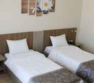 Bedroom 4 Work & Home Hotel Suites