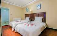 Kamar Tidur 7 Hongrui Business Hotel