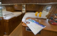 Bedroom 5 Domicil Yacht Hotel