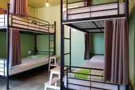 Kamar Tidur Mr.Comma Guesthouse - Hostel