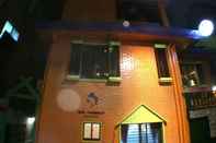 Bangunan Mr.Comma Guesthouse - Hostel