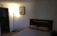 Phòng ngủ 5 Golden Arrow Motel