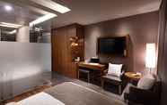 Kamar Tidur 3 Osong H Hotel Sejong City