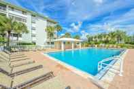 Swimming Pool Sun and Sea by Beachside Management