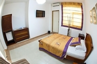 Kamar Tidur Hotel Embera