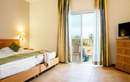 Bedroom 7 CALIMERA Delfino Beach Resort & Spa - All inclusive