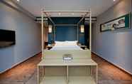 Bilik Tidur 5 HuangShan Eaves Art Hotel