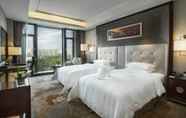 ห้องนอน 6 Tanglong International Hotel