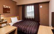 Kamar Tidur 7 Hotel Route Inn Higashi Hiroshima Saijo Ekimae