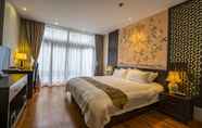 Kamar Tidur 7 Graceland Garden Court Hotel