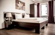 Bedroom 3 Aparthotel - Stadtvilla Premium