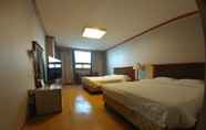 Bedroom 7 Prime Tourist Hotel