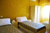 ห้องนอน Hotel Costa Jonica