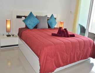 Kamar Tidur 2 Coconut Bay Club Suite 203