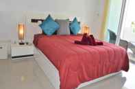 Kamar Tidur Coconut Bay Club Suite 203