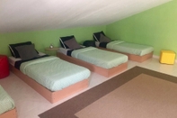 Kamar Tidur Pineapple Surf House - Hostel
