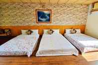 Phòng ngủ Pulicity B&B