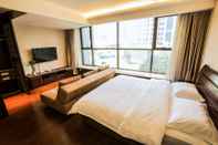 ห้องนอน World City Jiamei Service Apartment