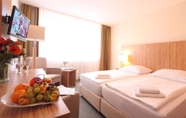 Phòng ngủ 2 AKZENT Hotel Am Burgholz