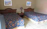 Kamar Tidur 3 Travel Inn & Suites