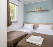 Bedroom 5 Domaine Résidentiel de Plein Air Odalys Le Port de la Chaine