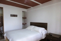 ห้องนอน Finca Hotel Villa Laura