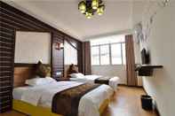 Bedroom ZhanguaJiaJie Huluju Inn