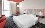 Bedroom 5 Radisson Hotel & Apartments Dammam Industry City