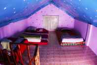 Phòng ngủ Nilbarno Cottage