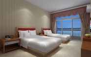 Kamar Tidur 4 Guangzhou Xiangxieli Hotel