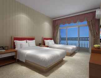 Bedroom 2 Guangzhou Xiangxieli Hotel