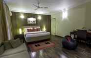 Bedroom 5 HM Suites & Studios Bangalore