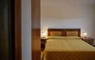 Phòng ngủ 6 Hotel Funtanaena