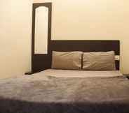 Kamar Tidur 2 Tranquil Serviced Apartments