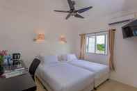 ห้องนอน MO Hotel Laamu