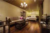 Kamar Tidur Blossom Dynasty Inn