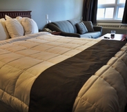 Kamar Tidur 5 Hotel & Suites Les Laurentides Saint Sauveur