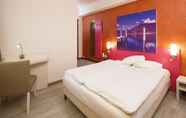 Bilik Tidur 3 Acquarello Swiss Quality Hotel