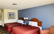 Bedroom 2 Days Inn by Wyndham Trumann AR