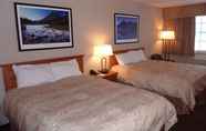 Bedroom 5 Woodlands Inn & Suites