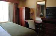 Bedroom 7 Magnuson Hotel Commerce