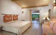 Kamar Tidur 2 Park Hotel Cala di Lepre & Spa