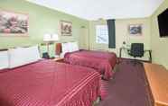 Bedroom 5 Days Inn & Suites by Wyndham Terre Haute