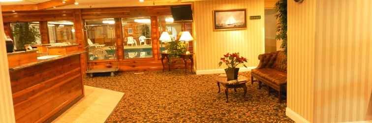 Lobby Ambassador Inn & Suites