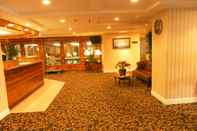 Lobby Ambassador Inn & Suites