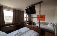 Bedroom 2 das Reinisch business hotel