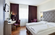 Bedroom 6 das Reinisch business hotel