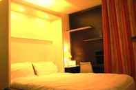 Kamar Tidur At Home Appart'Hotel